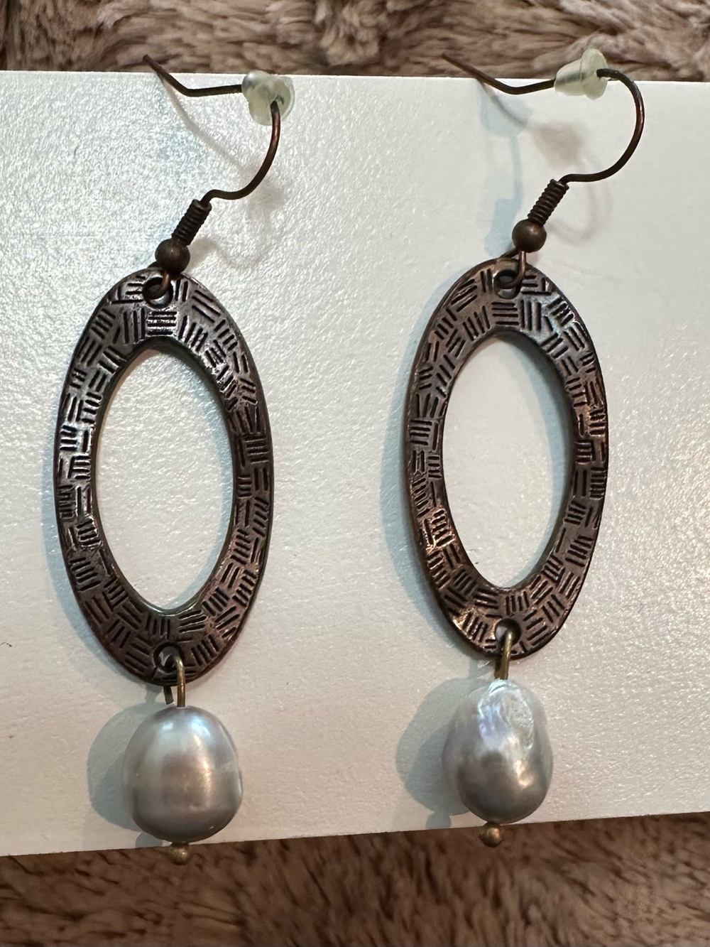 Handcrafted Bronze Oval Drop Earrings with Silver Pearl Accent